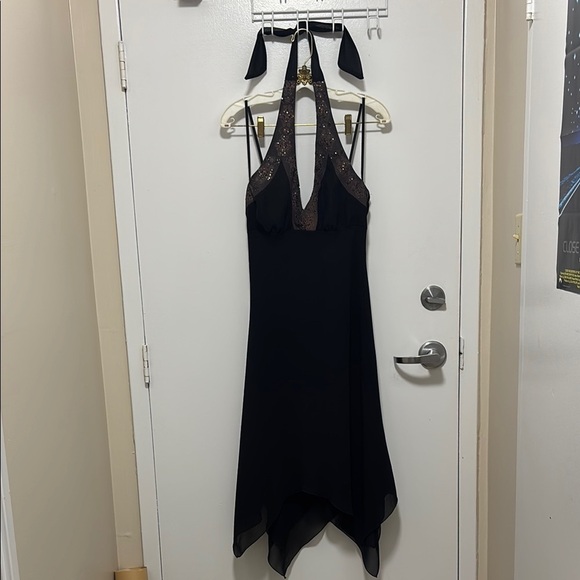 Black Asymmetrical Cocktail Dress with Halter Neckline and Sleeveless De… - Picture 1 of 1